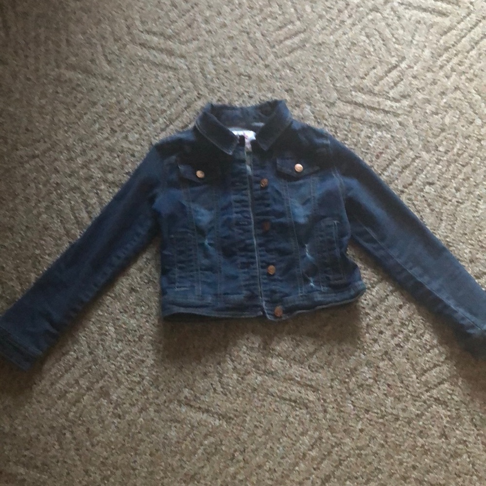 Distressed jean jacket